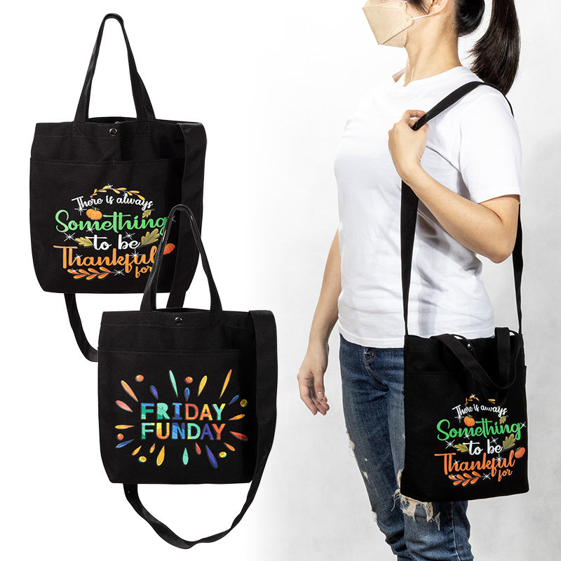 黑色外口袋手提斜背帆布包