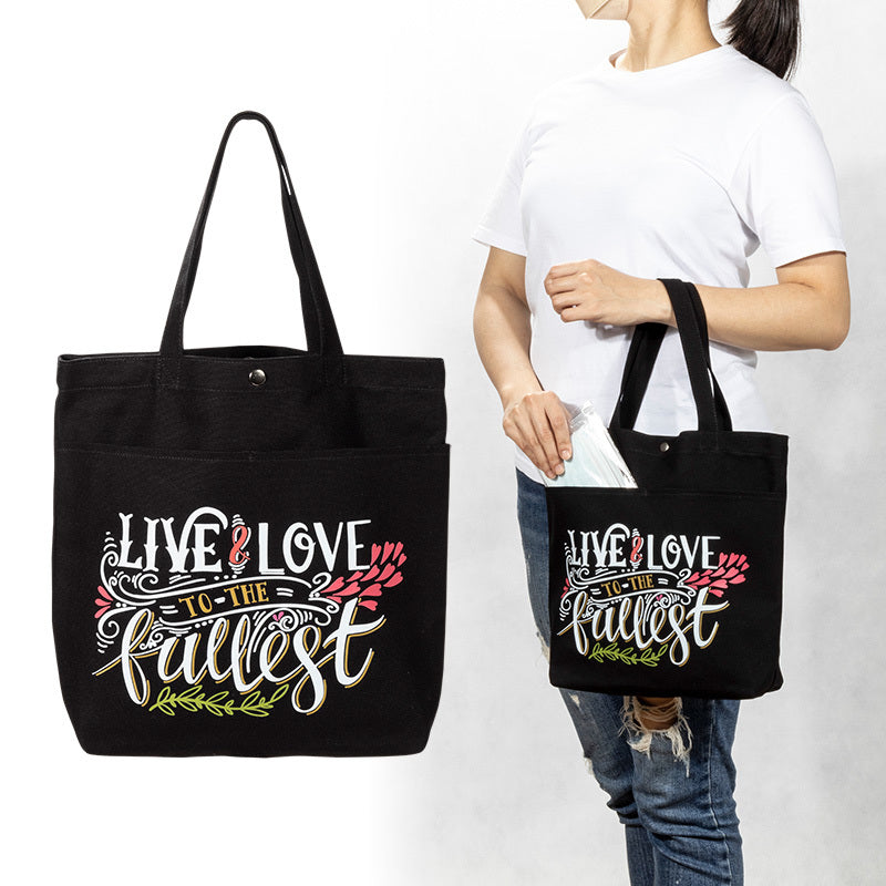 黑色外口袋帆布手提袋